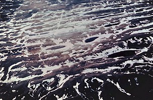 Figure 5. Air view of the Prophets Mountains. These ice-thrust hills consist of slabs of material that were pushed up by the ice from east to west. The snow marks troughs between ice-thrust ridges. 