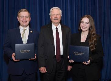 2026 USSYP Delegates Bridger Rivinius and Alexis Thompson pose for photo with ND Senator Hoeven.