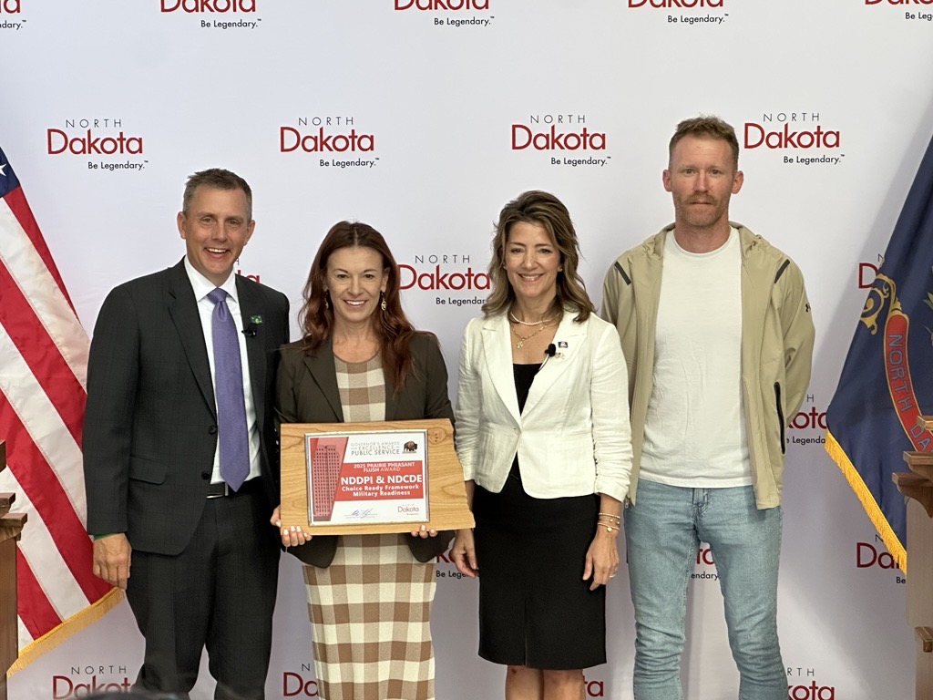 From left: Gov. Kelly Armstrong, State Superintendent Kirsten Baesler, Lt. Gov. Michelle Strinden, and North Dakota Department of Public Instruction Assessment Director Stanley Schauer.