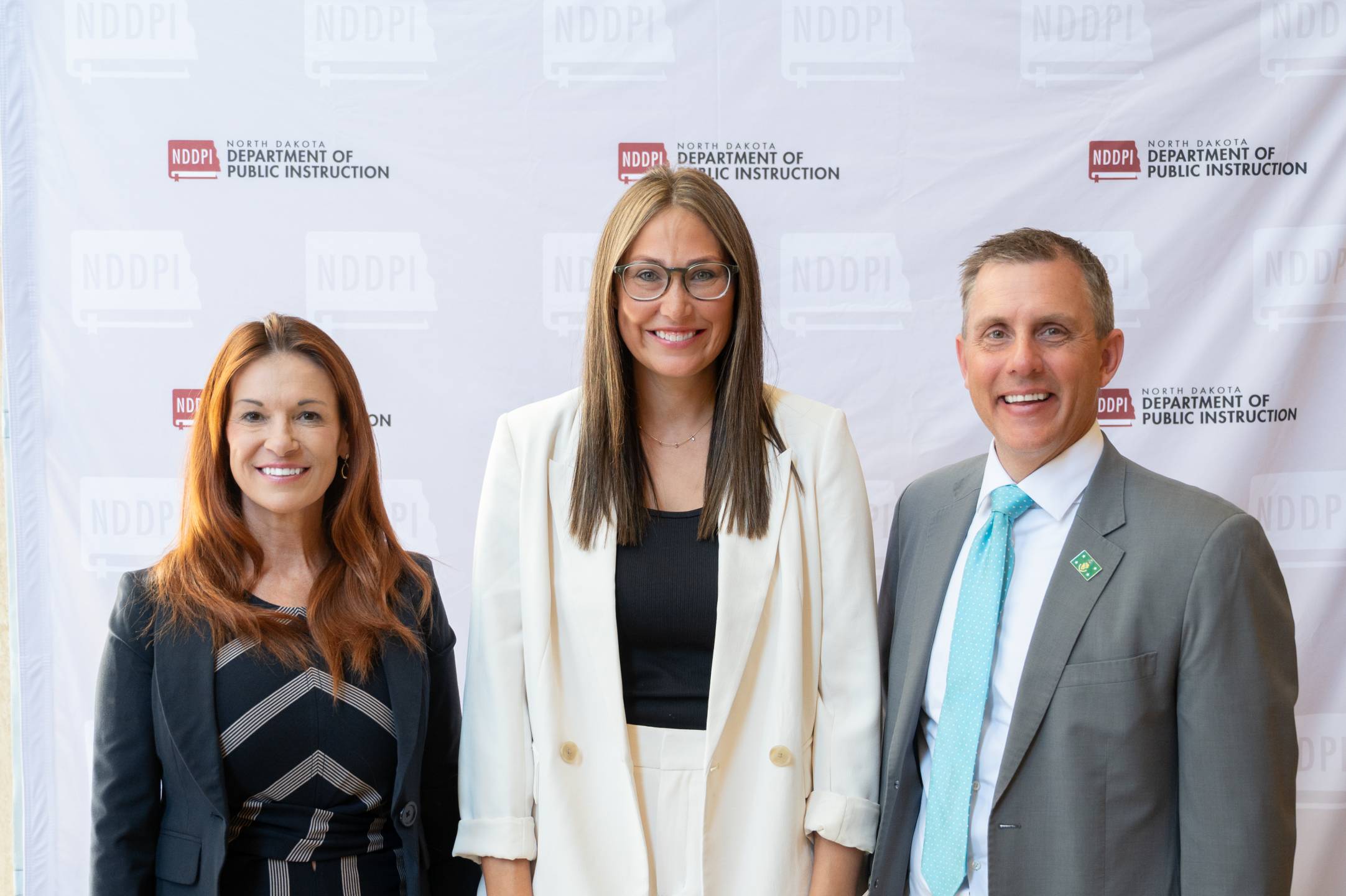Pictured from left: Former State Superintendent Kirsten Baesler, 202 North Dakota Teacher of the Year Frannie Tunseth, and Gov. Kelly Armstrong.