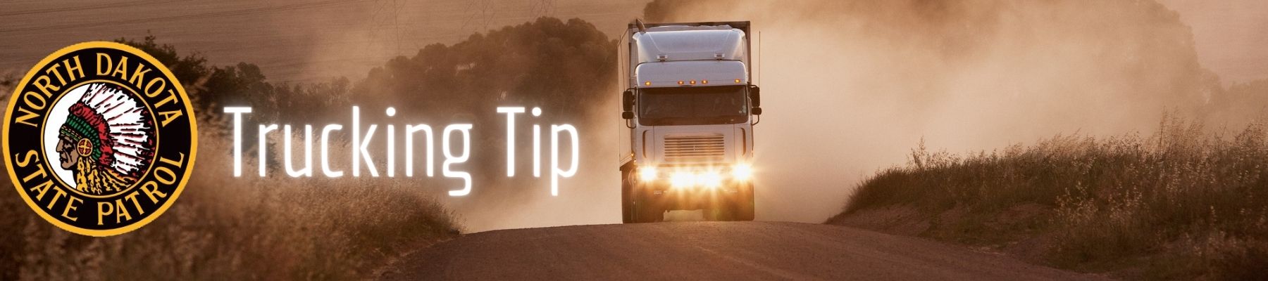 CMV moving down dusty road with NDHP logo