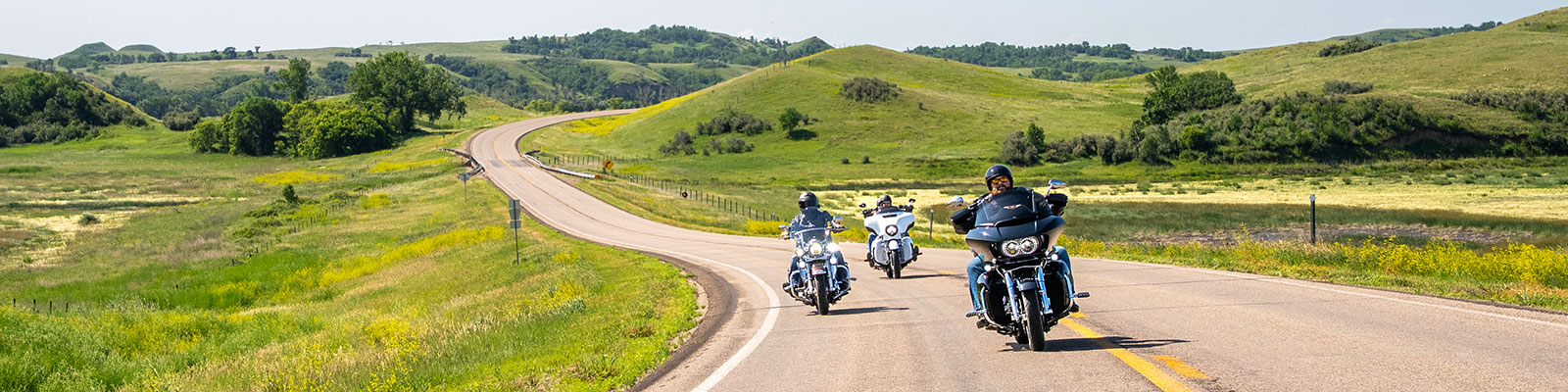 Motorcycle riders enjoy a summer ride on the Standing Rock National Native American Scenic Byway.