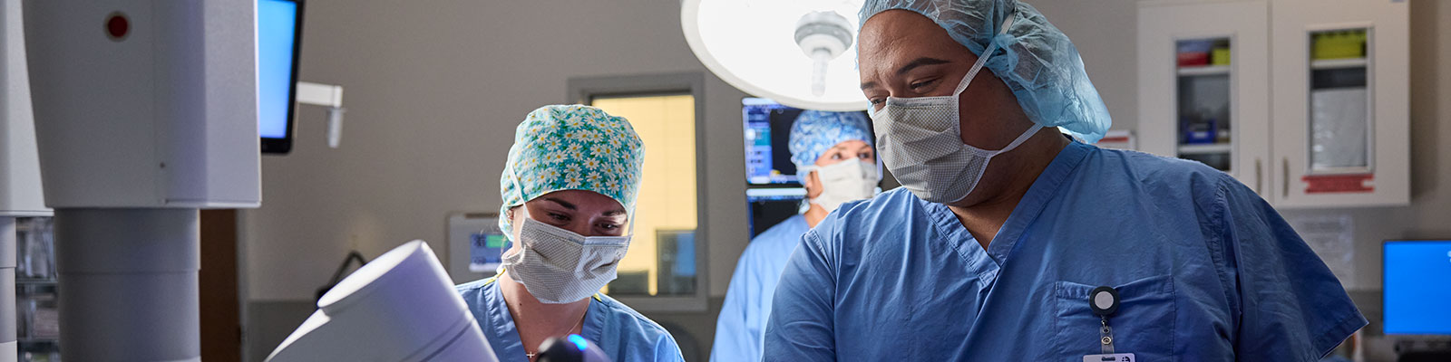 Medical workers in an operating room.
